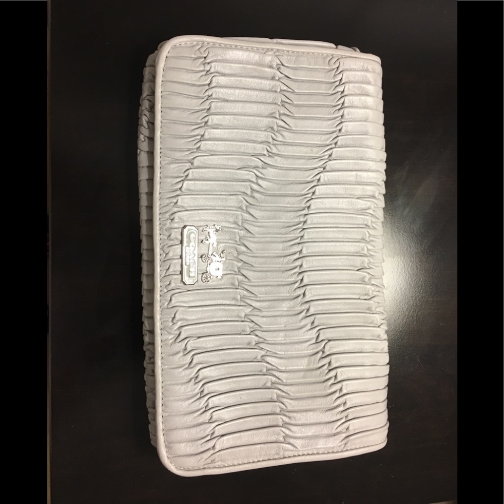 Never used Coach Clutch bag